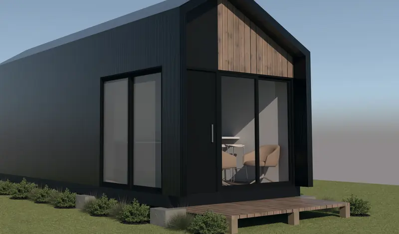 Proyecto Residencial LV: volumen compacto de revestimiento oscuro, madera y fachada vidriada